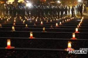 南京市民悼念大屠杀同胞遇难73周年